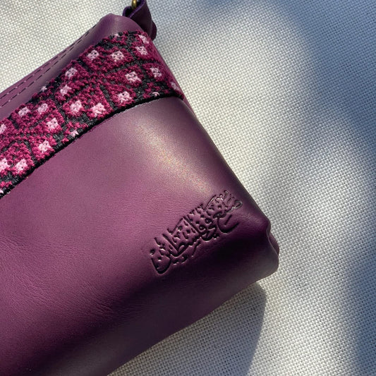 Purple embroidered crossbody leather bag