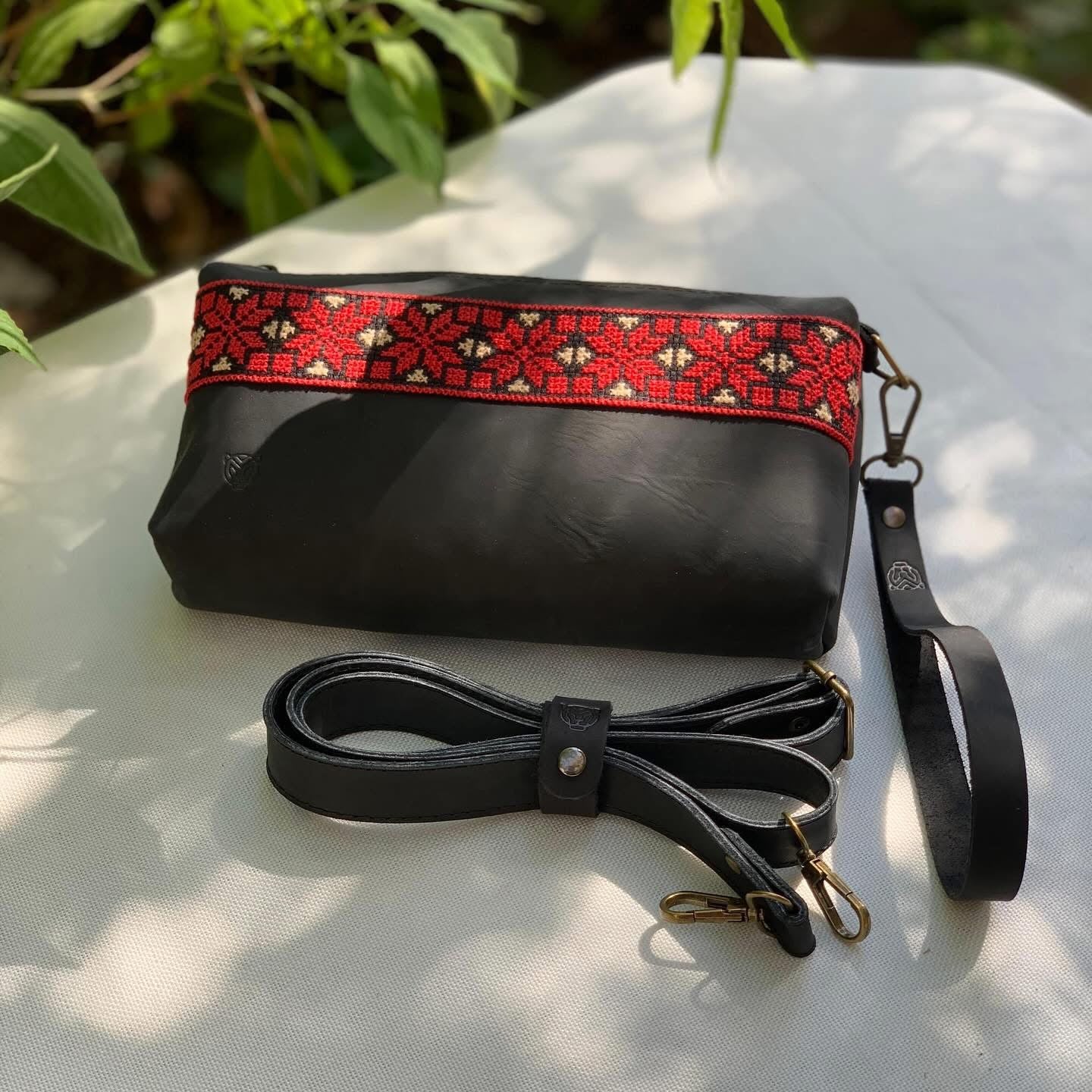 Black embroidered crossbody leather bag