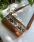 Camel embroidered crossbody leather bag